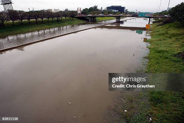 Interstate 10 is flooded and impassable following Hurricane Ike September 14, 2008 in Houston, Texas. Ike caused extensive damage along the Texas...