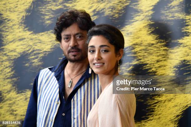 Actor Irrfan Khan and Actress Golshifteh Farahani pose during the 'The Song of Scorpions' photocall at the 70th Locarno Film Festival on August 9,...