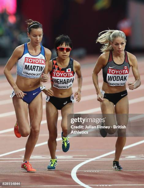 Jess Martin of Great Britain, Miyuki Uehara of Japan and Natasha Wodak of Canada compete in the Women's 10000 metres final during day two of the 16th...