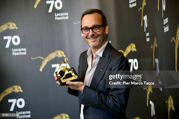 Producer Michel Merkt poses with the Pardo for the Rezzonico Award during the 70th Locarno Film Festival on August 9, 2017 in Locarno, Switzerland.