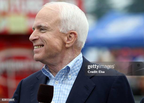 Republican presidential candidate John McCain addresses the fans before the NASCAR Sprint Cup Series Sylvania 300 at New Hampshire Motor Speedway on...
