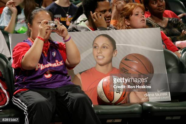 Phoenix Mercury fan gets some more photos of Diana Taurasi of the Mercury as they took on the Indiana Fever at Conseco Fieldhouse September 14, 2008...
