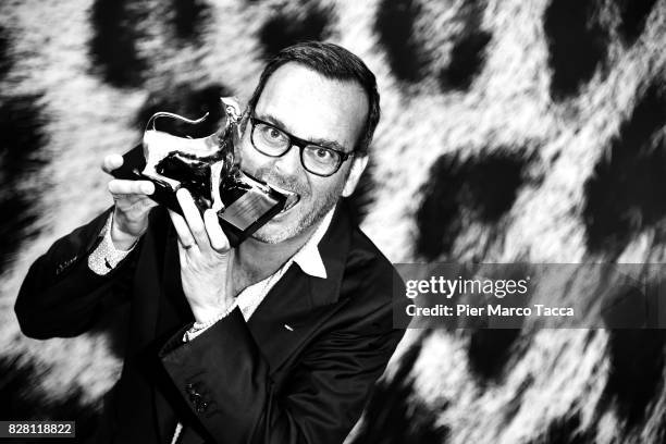 Producer Michel Merkt poses with the Pardo for the Rezzonico Award during the 70th Locarno Film Festival on August 9, 2017 in Locarno, Switzerland.