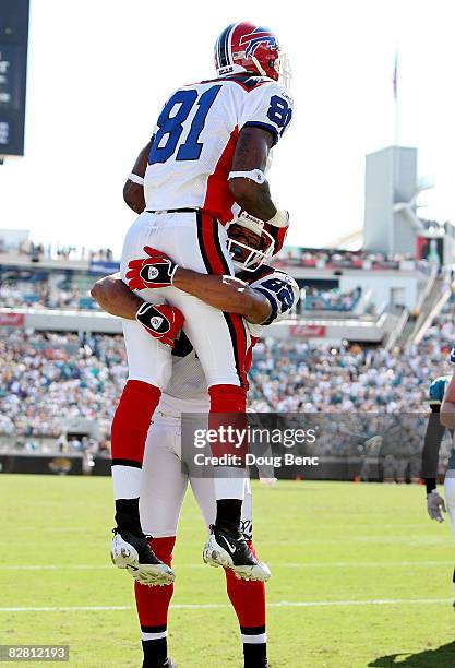 Wide receivers Josh Reed and James Hardy of the Buffalo Bills celebrate after a tochdown catch by Hardy late in the fourth quarter against the...
