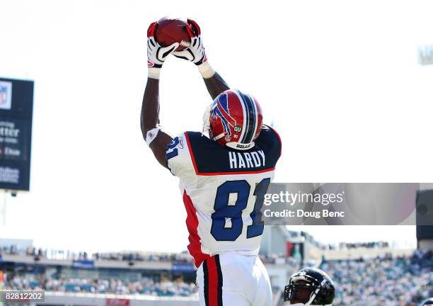 Wide receiver James Hardy of the Buffalo Bills reaches up to make a tochdown catch late in the fourth quarter against the Jacksonville Jaguars at...