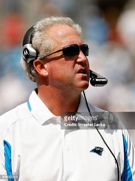 Head coach John Fox of the Carolina Panthers looks at the scoreboard during their game against the Chicago Bears at Bank of America Stadium on...