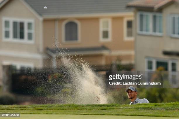 Stephen Curry plays a shot out of a bunker on the twelfth hole during round two of the Ellie Mae Classic at TCP Stonebrae on August 4, 2017 in...