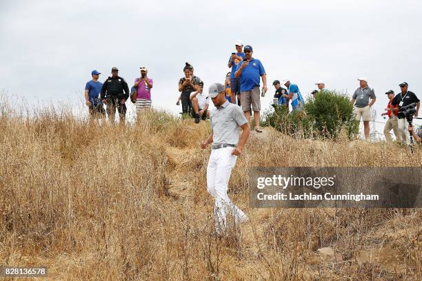 Stephen Curry looks for his ball in the rough on the eighth hole during round two of the Ellie Mae Classic at TCP Stonebrae on August 4, 2017 in...