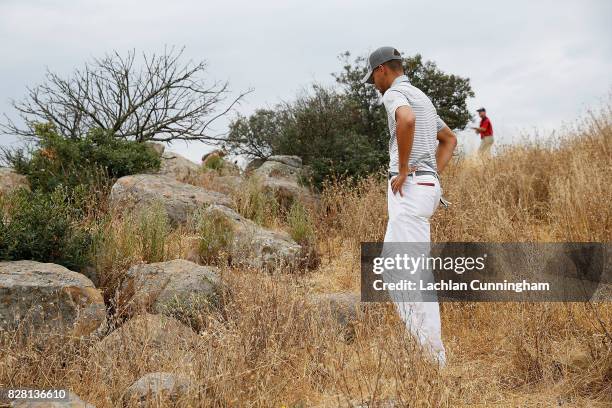 Stephen Curry looks for his ball in the rough on the eighth hole during round two of the Ellie Mae Classic at TCP Stonebrae on August 4, 2017 in...