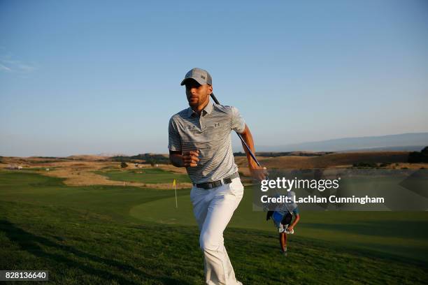 Stephen Curry jogs from the seventeenth green after scoring a birdie during round two of the Ellie Mae Classic at TCP Stonebrae on August 4, 2017 in...