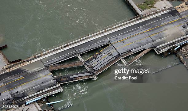 Washed out bridge is shown after Hurricane Ike September 14, 2008 in Gilchrist, Texas. Floodwaters from Hurricane Ike are reportedly as high as eight...