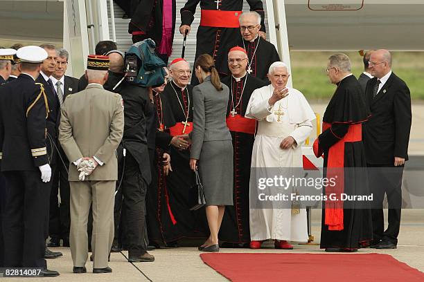Pope Benedict XVI arrives at Orly airport welcomed by French President Nicolas Sarkozy and his wife Carla Bruni-Sarkozy, on September 12, 2008 in...