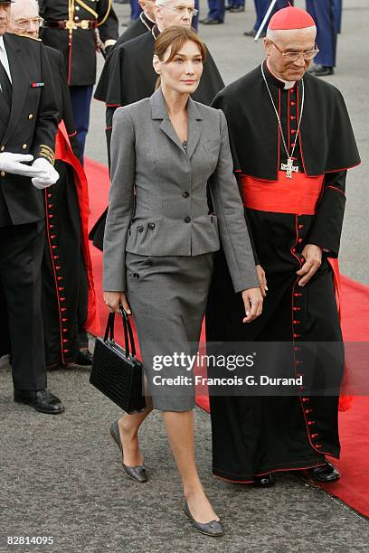 Carla Bruni-Sarkozy looks on during the arrival of Pope Benedict XVI at Orly airport on September 12, 2008 in Paris, France. The four day trip by the...