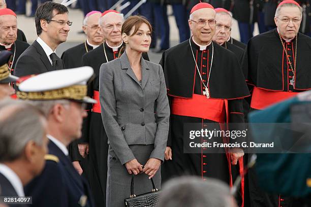 Carla Bruni-Sarkozy looks on during the arrival of Pope Benedict XVI at Orly airport on September 12, 2008 in Paris, France. The four day trip by the...