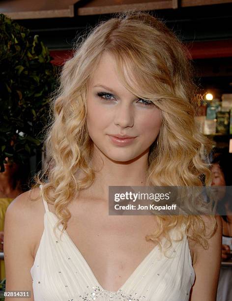 Singer Taylor Swift arrives to the World Premiere of Warner Premiere's "Another Cinderella Story" at the Pacific Theatres at the Grove on September...