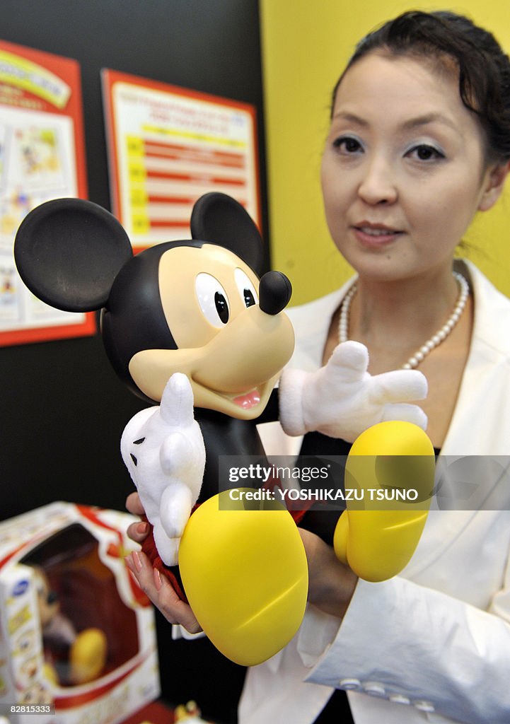 Japanese toy maker Sega Toys employee displays a Mickey Mouse shaped...  News Photo - Getty Images