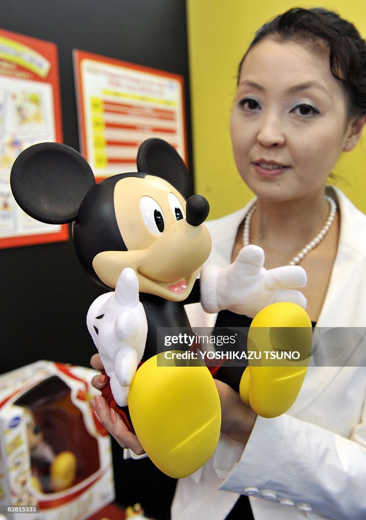 Japanese toy maker Sega Toys employee displays a Mickey Mouse shaped... News Photo - Getty Images Japanese toy maker Sega Toys employee displays a Mickey Mouse shaped... News Photo - Getty Images