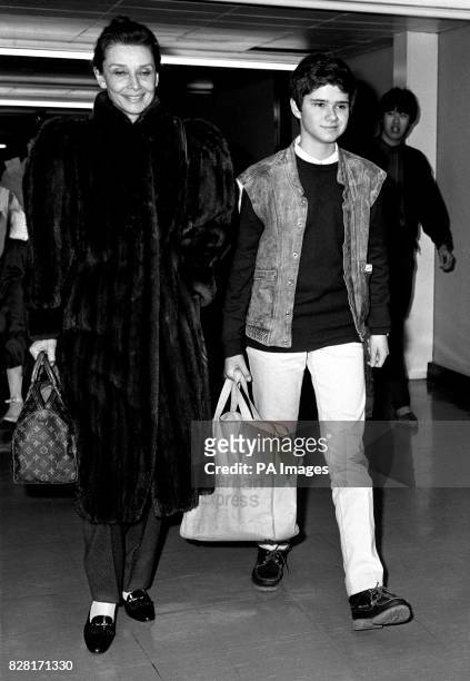 Audrey Hepburn , and her son Luca Dotti , arriving at Heathrow airport, after their flight from Rome.