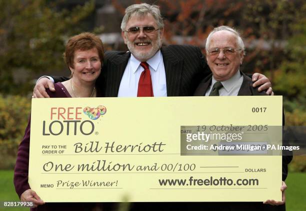 FreeLotto.com winner Bill Herriot from Blantyre with his wife May, Wednesday October 19 receive the cheque after becoming the first ever one million...
