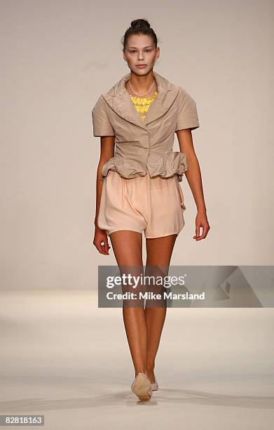 Model walks the runway at the London Fashion Week Spring/Summer 2009 John Rocha fashion show at Natural History Museum on September 15, 2008 in...