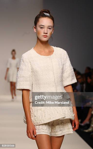 Model walks the runway at the London Fashion Week Spring/Summer 2009 John Rocha fashion show at Natural History Museum on September 15, 2008 in...