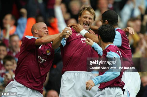 West Ham United's Teddy Sheringham celebrates scoring the opening goal against Middlesbrough with Paul Konchesky during the Barclays Premiership...