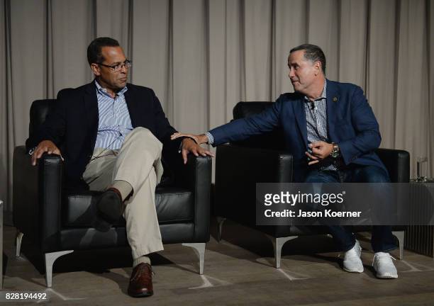 John Viera, Director of Sustainability at Ford and Philip Levine, Mayor of Miami Beach speak on stage during FordVICE Impact's "The Third Industrial...