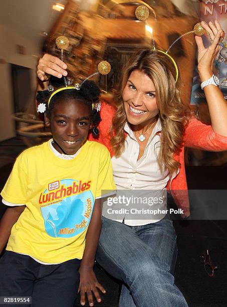 Lori Loughlin reads a new book to thirty local kids and announces the Lunchables Million Page Mission, which encourages parents to read to their...