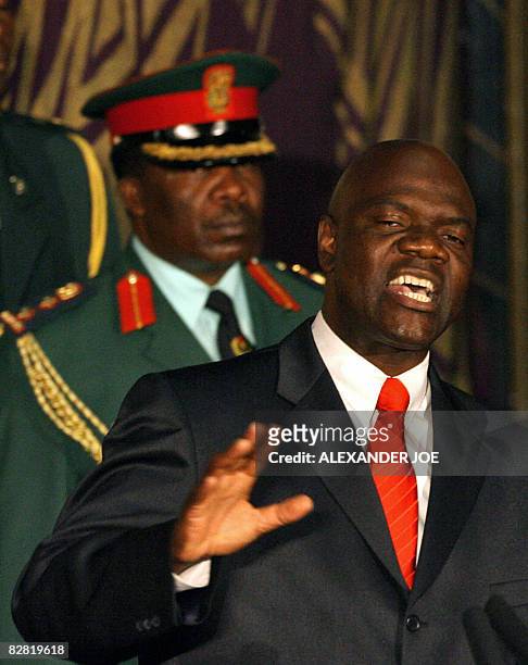 Zimbabwe new Deputy Prime Minister Arthur Mutambara delivers a speech after signing the power-sharing accord on September 15, 2008 in Harare. Mbeki...