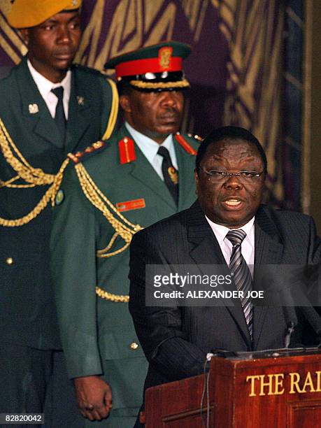 Zimbabwe's new Prime Minister Morgan Tsvangirai delivers a speech after signing the power-sharing accord on September 15, 2008 in Harare. Zimbabwe's...