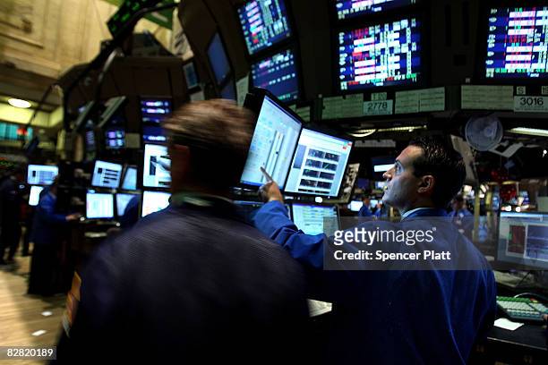 Traders work on the floor of the New York Stock Exchange September 15, 2008 in New York City. In morning trading, U.S. Stocks suffered a steep loss...
