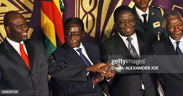 Zimbabwean MDC breakaway faction leader Arthur Mutambara, Zimbabwe's President Robert Mugabe, opposition's leader Morgan Tsvangirai and South African...