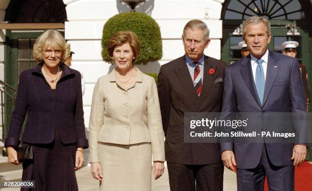 The Duchess of Cornwall, Laura Bush, the Prince of Wales and President George W Bush on the South lawn of the White House in Washington DC, Wednesday...