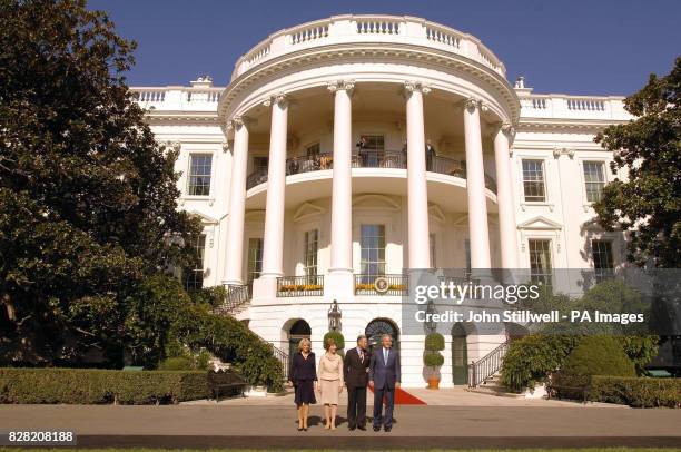 The Duchess of Cornwall, Laura Bush, the Prince of Wales and President George W Bush on the South lawn of the White House in Washington DC, Wednesday...