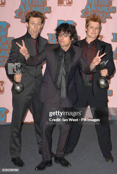 Green Day, winners of Best Album and Best Rock Act, backstage at the MTV Europe Music Awards, from the Atlantic Pavilion, Lisbon, Portugal, Thursday...