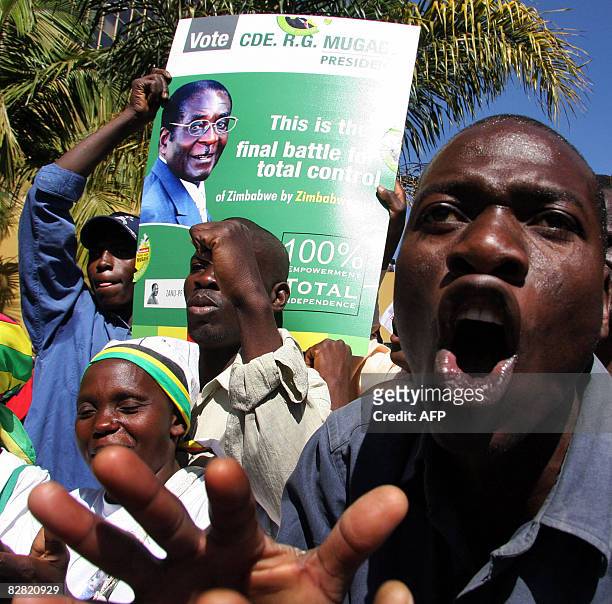 Zimbabwean ruling party ZANU-PF supporters celebrate the historic deal signed on September 15, 2008 by Zimbabwean leaders in Harare. Zimbabwe's new...