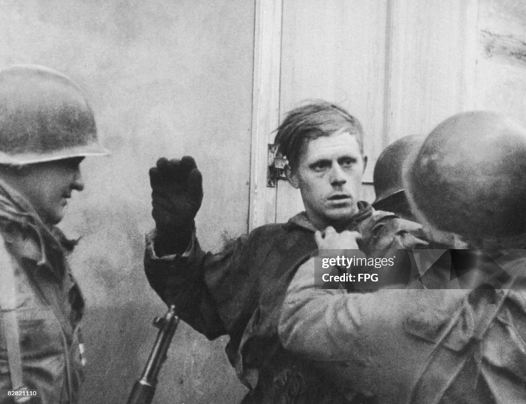 A Surrender A German soldier surrenders to the US Army in the Rhine region of ...