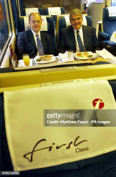 File Picture of First Group Finance Director Dean Finch and Chief Executive Moir Lockhead dated 10 May 2005.Transport operator FirstGroup today...