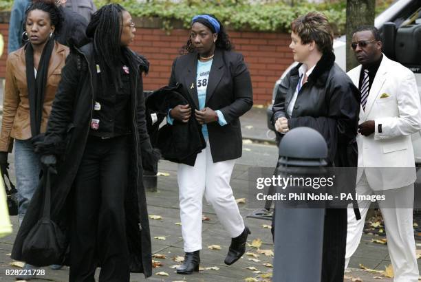 Gee Walker mother of murdered Liverpool teenager Anthony Walker, is accompanied by family members as she arrives at Preston Crown Court, Monday...