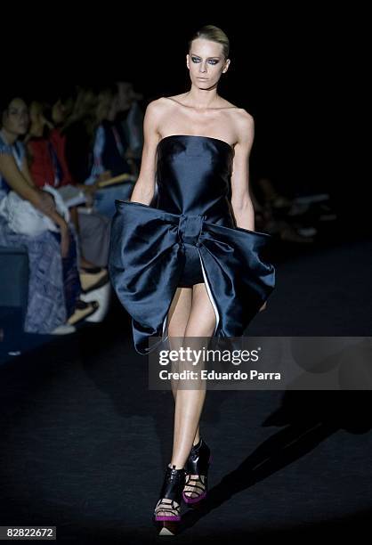 Model walks down the catwalk during the Amaya Arzuaga show during spring/summer 2008-2009 Cibeles Fashion Week at the IFEMA on September 15, 2008 in...