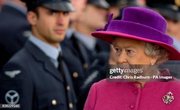 Britain's Queen Elizabeth II inspects the guard of honour at RAF Coltishall, Thursday November 17 2005, marking the 65th anniversary of the airfield....