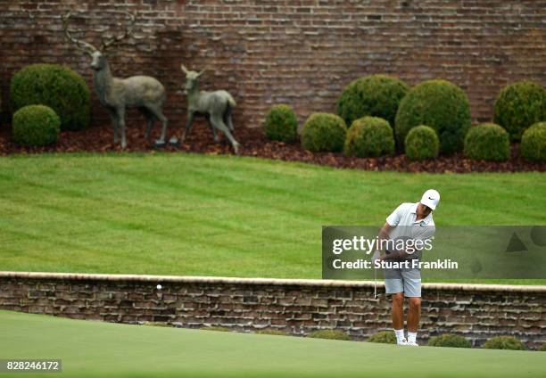 Cody Gribble of the United States plays his shot during a practice round prior to the 2017 PGA Championship at Quail Hollow Club on August 9, 2017 in...