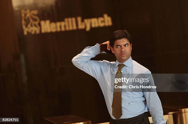 Man leaves Merrill Lynch's offices in the World Financial Center September 15, 2008 in New York City. Bank of America Corp., the largest U.S....