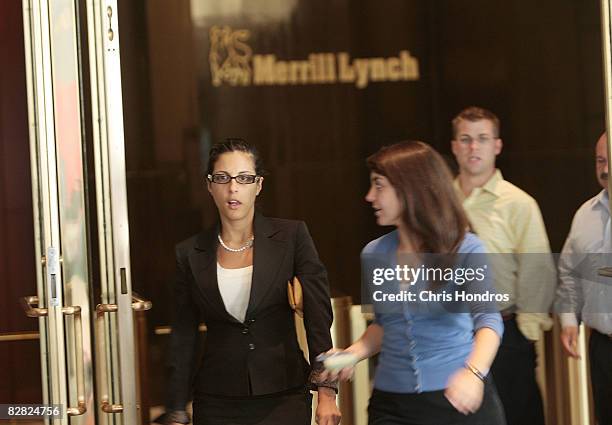 People leave Merrill Lynch's offices in the World Financial Center September 15, 2008 in New York City. Bank of America Corp., the largest U.S....
