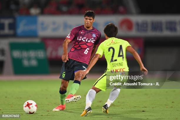Eder Lima of Ventforet Kofu takes on Takahiro Sekine of Urawa Red Diamonds during the J.League J1 match between Ventforet Kofu and Urawa Red Diamonds...