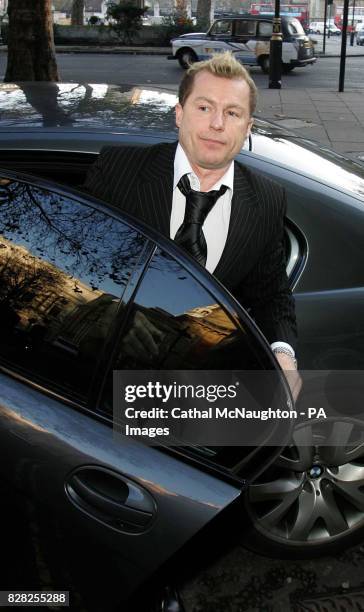 Former Coronation Street star Christopher Quinten arrives at Middlesex Guildhall County Court, London, Wednesday December 7, 2005 where he is charged...