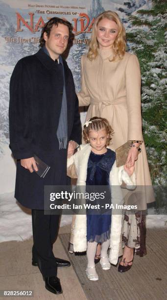 Model Jodie Kidd with husband Aidan Butler and her niece as they arrive for the Royal Film Performance & World Premiere of 'The Chronicles Of...