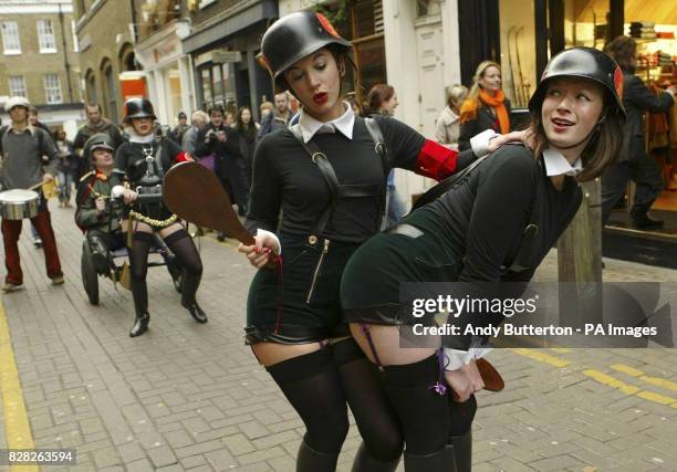 Coco de Mer's Hanky Spanky shop girls during a Christmas procession around Covent Garden to launch the opening of Coco de Mer's 'Hanky Spanky Grotto'...