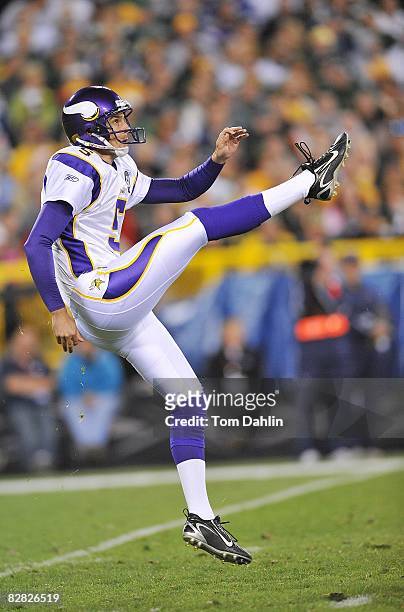 Chris Kluwe of the Minnesota Vikings punts the ball during an NFL game against the Green Bay Packers at Lambeau Field, on September 8, 2008 in Green...