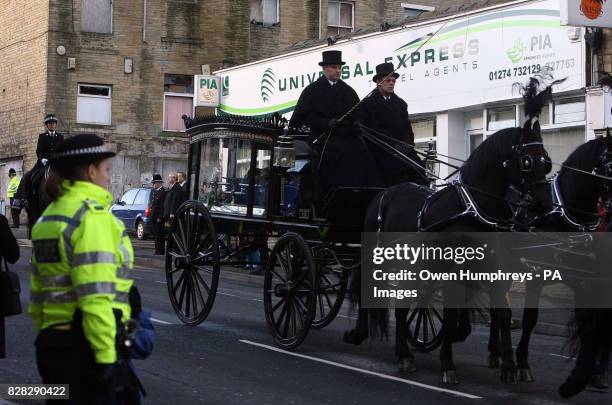 Horse-drawn carriage carries the coffin of murdered police officer Sharon Beshenivsky Wednesday January 11 after she was gunned down on as she...